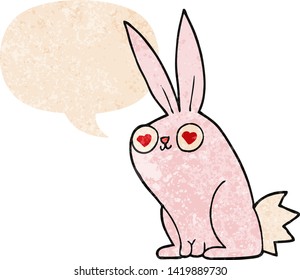 cartoon bunny rabbit in love with speech bubble in grunge distressed retro textured style