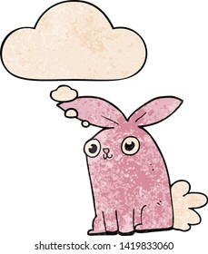 cartoon bunny rabbit with thought bubble in grunge texture style
