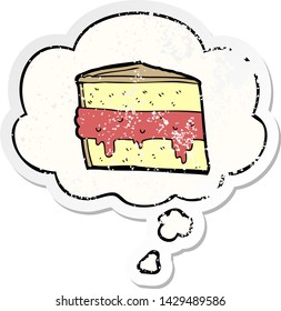 cartoon cake with thought bubble as a distressed worn sticker