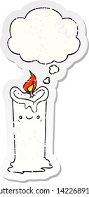 cartoon candle with thought bubble as a distressed worn sticker