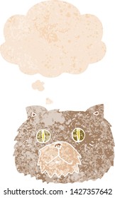 cartoon cat face with thought bubble in grunge distressed retro textured style