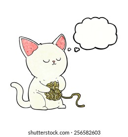 cartoon cat playing with ball of yarn with thought bubble