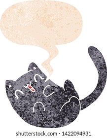 gatito de dibujos animados con burbuja de habla en un estilo retro angustiado con textura grunge