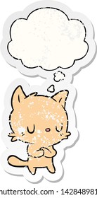 cartoon cat with thought bubble as a distressed worn sticker