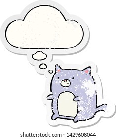 cartoon cat with thought bubble as a distressed worn sticker