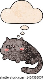 cartoon cat with thought bubble in grunge texture style