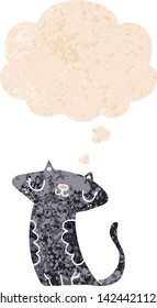 cartoon cat with thought bubble in grunge distressed retro textured style
