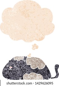 cartoon cat with thought bubble in grunge distressed retro textured style