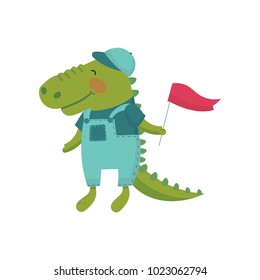 Cartoon character of baby crocodile with red flag in paw. Wild green animal dressed in blue overalls, t-shirt and cap. Flat vector design for postcard or book