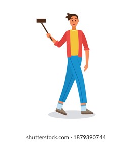 Caricatura de un joven o un chico que toma fotografías de selfie usando un aparato de teléfono móvil y palos, ilustración vectorial plana aislada en fondo blanco.