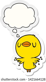 cartoon chick flapping wings with thought bubble as a printed sticker
