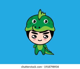 Cartoon child in funny crocodile costume.