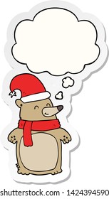 cartoon christmas bear with thought bubble as a printed sticker