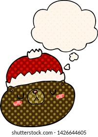 cartoon christmas bear with thought bubble in comic book style