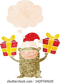 cartoon christmas bear with thought bubble in grunge distressed retro textured style