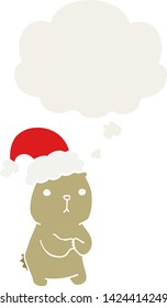 cartoon christmas bear worrying with thought bubble in retro style