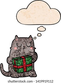 gatito de navidad de dibujos animados con burbuja de pensamiento al estilo de textura gruesa