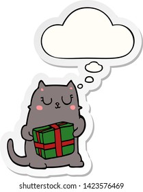 cartoon christmas cat with thought bubble as a printed sticker