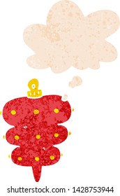 cartoon christmas decoration with thought bubble in grunge distressed retro textured style