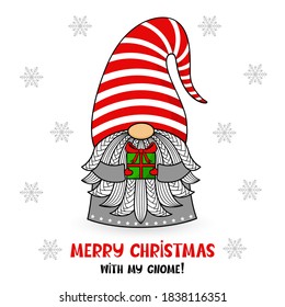 Cartoon Christmas gnome in a hat with gift and text. Vector character with beard and snowflakes. Holiday and new year symbol. Cute illustration. For postcards, invitations, flyers.