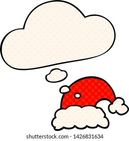 cartoon christmas hat with thought bubble in comic book style