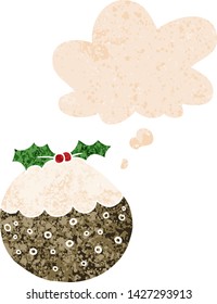 cartoon christmas pudding with thought bubble in grunge distressed retro textured style