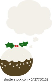 cartoon christmas pudding with thought bubble in retro style