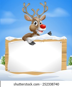 Cartoon Christmas Reindeer Sign of one of Santas cute red nosed reindeer a snow covered sign and pointing sign