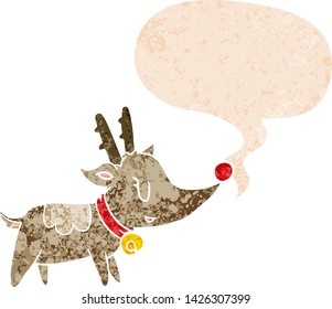 cartoon christmas reindeer with speech bubble in grunge distressed retro textured style