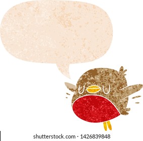 cartoon christmas robin with speech bubble in grunge distressed retro textured style