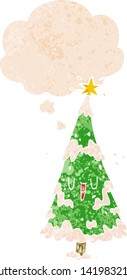 árbol de navidad de dibujos animados con burbuja de pensamiento en un estilo retro angustiado y con textura estrafalaria