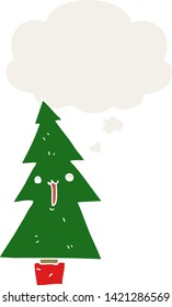 cartoon christmas tree with thought bubble in retro style