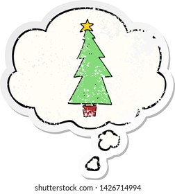 árbol de navidad de dibujos animados con burbuja de pensamiento como pegatina gastada angustiada