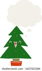 cartoon christmas tree with thought bubble in retro style