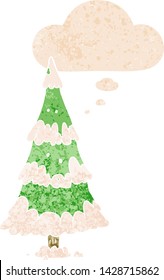 árbol de navidad de dibujos animados con burbuja de pensamiento en un estilo retro angustiado y con textura estrafalaria