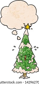 cartoon christmas tree with thought bubble in grunge texture style