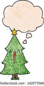Weihnachtsbaum mit Denkblase im Grunge-Stil