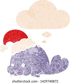 cartoon christmas walrus with thought bubble in grunge distressed retro textured style