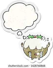 cartoon chrstmas pudding with thought bubble as a distressed worn sticker
