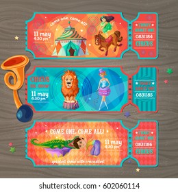 Cartoon circus show invitation tickets set with artists trained animals and trumpet on wooden background vector illustration