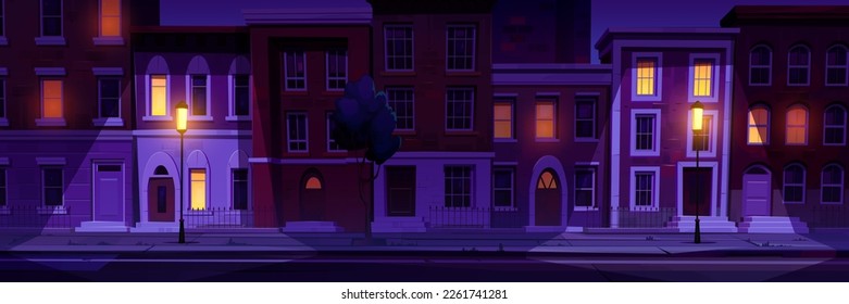 Cartoon city street at night. Vector illustration of town apartment houses with cozy yellow light in windows on brick wall facade, empty street, road illuminated with light posts. Urban neighborhood