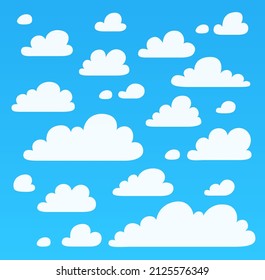 Cartoon clouds on blue sky background vector design. Illustration of flufy white clouds isolated on background. Abstratc set of different shapes icons