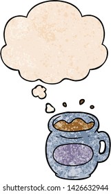 cartoon coffee cup with thought bubble in grunge texture style