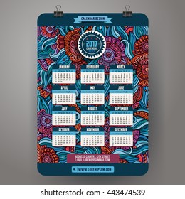 Cartoon colorful hand drawn doodles floral 2017 year calendar template. English, Sunday start. Very detailed, with lots of objects illustration. Funny vector artwork. 
