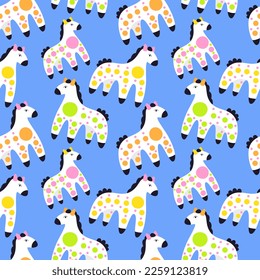 Cartoon colorful horses pattern on a blue background. 