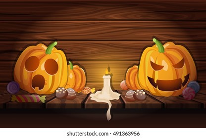 Cartoon composition with pumpkins various halloween sweets and candle on dark wood background vector illustration