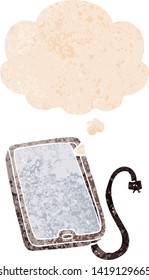 cartoon computer tablet with thought bubble in grunge distressed retro textured style