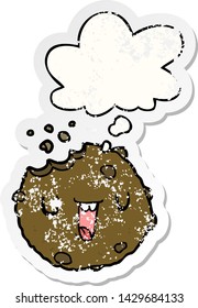 cartoon cookie with thought bubble as a distressed worn sticker