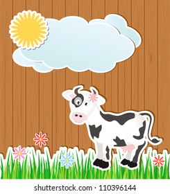 cartoon cow on grass. sticker on wooden background