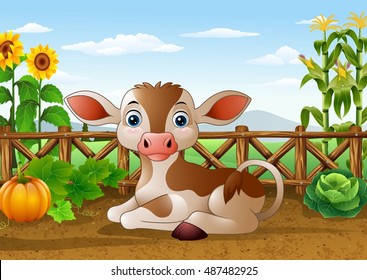 Cartoon cow sitting in the farm